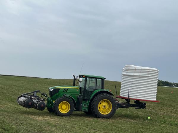 Our John Deere 6145 M tractor which backfiles all of our ditches. Along with our stringer on the back of the tractor. 