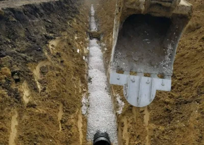 18-inch groover plate, bedded tile in 1-inch clean limestone.