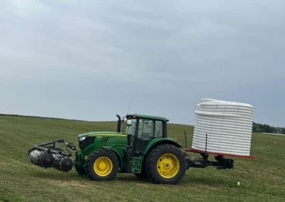 Our John Deere 6145 M tractor which backfiles all of our ditches. Along with our stringer on the back of the tractor.